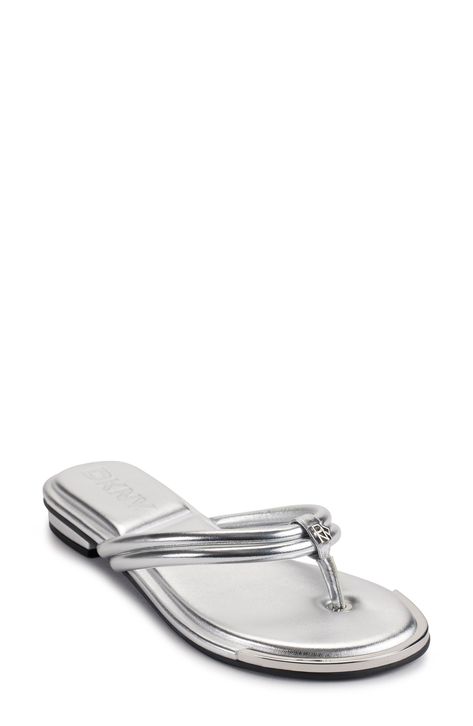 A glossy metallic finish plays up the contemporary glamour of a lightly cushioned flip-flop embellished with logo hardware. Cushioned footbed Synthetic upper, lining and sole Imported Flip Flop, Flip Flops, Nordstrom, Size 7, Silver, Free Shipping