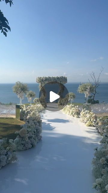 Sweetbella Decoration on Instagram: "Breathtaking ocean view 🤍
Customized white door to create a dramatic entrance , especially for the Bride, Erika 🤍
..
..
Venue @ayanaresort 
WO @by.hilda @ken_william 
..
..

#bali #balievent #baliwedding #baliweddingdestination #baliweddingdecor #baliweddingdecoration #baliweddingstylist #weddingbali #weddinginbali #thebalibride #weddinginspiration #flowers #floristbali #thebridestory #weddingideas #flowerbouquets #cliffweddingbali #dreamwedding #wallofflowers #timelesswedding #classicwedding #weddingceremony #wedluxe" Cliff Wedding, Dramatic Entrance, White Door, Bali Wedding, Wedding Stylist, White Doors, Timeless Wedding, Wedding Classic, Flower Wall