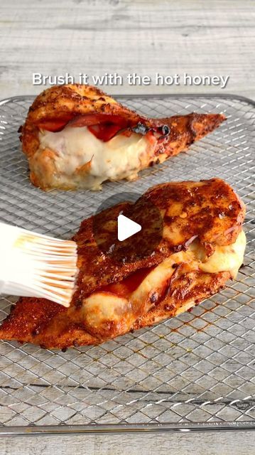 Fitwaffle | Eloise Head on Instagram: "Air fryer chicken: Hot Honey Chorizo & Mozzarella Stuffed Chicken 😍

This chicken is so juicy and delicious! It’s stuffed with chorizo and gooey mozzarella cheese, and topped with hot honey 🤤 It’s so quick and easy to make and it takes just 20 mins in the air fryer (but you can also bake it in the oven)

Sound on for full instructions 🔉

All you need is:

2 large chicken breasts
Cajun seasoning
Sliced chorizo
Sliced fresh mozzarella
Hot honey (2 tbsp honey & hot sauce to taste)

Rocket leaves
Cherry tomatoes, halved
1/2 tsp salt
1 tbsp olive oil
1 tbsp balsamic glaze

🌟 Make sure the chicken is cooked though to 75C/165F

Enjoy!
#fitwaffle #fitwafflekitchen" Honey Chorizo, Chicken Hot Honey, Honey Hot Sauce, Mozzarella Stuffed Chicken, Rocket Leaves, Chicken Chorizo, Chorizo Recipes, Mozzarella Recipes, Mozzarella Chicken