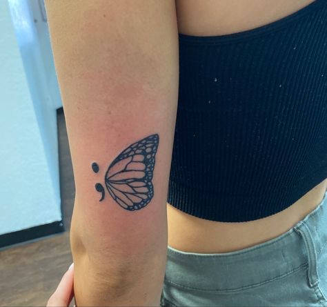 Half Butterfly Half Semi Colon Tattoo, Semi-colon Tattoo Butterfly Wrist, Butterfly Semi Colon Tattoos For Women, Creative Semi Colon Tattoos, Colon Butterfly Tattoo, Spearfishing Tattoo, Semi Colon Tattoos For Women, Butterfly Semi Colon, Prevention Tattoo