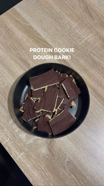 Brooke Neal on Instagram: "PROTEIN COOKIE DOUGH BARK. Wowow this may be the best dessert recipe I’ve ever made. This will make grabbing a healthier option super simple this week when I’m craving something sweet! Protein I use: @arbonne Chocolate chips I use: @enjoylifefoods Make it + let me know what you think 🍫👩🏼‍🍳🍪😍✨" Arbonne Cookie Dough Recipe, Cookie Dough Bark Healthy, Viral High Protein Cookie Dough Bark, Protein Chocolate Bark, Protein Bark Recipe, Cookie Dough Bark Recipe, Protein Cookie Dough Bark, High Protein Cookie Dough Bark, Shaklee Recipes