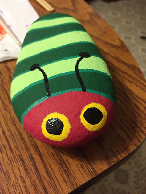 my first caterpillar. Rock Painting Ideas Funny, Caterpillar Rock Painting Ideas, Animal Rock Painting Ideas, Caterpillar Rock Painting, Rock Caterpillar, Caterpillar Painted Rocks, Worm Painted Rocks, Painted Rock Caterpillar, Character Painted Rocks