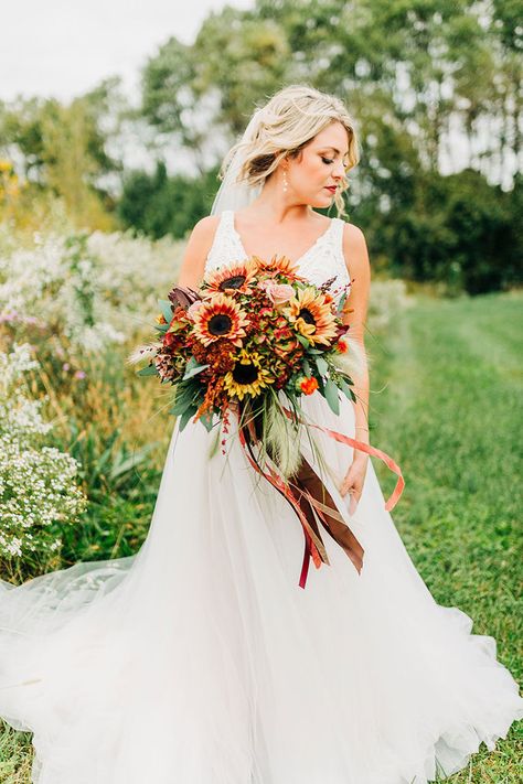 Rustic Bouquet with Sunflowers and Dahlias in Shades of Gold Fall Bouquet Wedding Sunflowers, Boho Wedding With Sunflowers, Sunflower And Terracotta Wedding, Fall Bridal Bouquet With Sunflowers, Fall Sunflower Wedding Bouquet, Weddings With Sunflowers, Fall Bouquet Sunflower, Fall Wedding Bouquets With Sunflowers, Sunflower And Marigold Bouquet