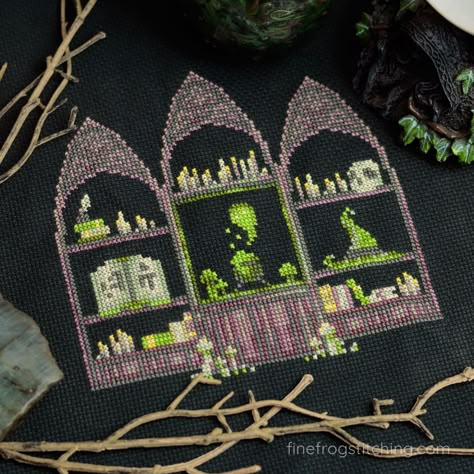 "In a crooked cottage nestled deep within the ancient woods, lives a witch with a passion for potions. Her workspace, awash in a green ethereal glow, is a bewitched wonderland of floating ingredients and tomes that whisper secret recipes. Sometimes the skull on the top shelf makes awful dad jokes, and her hat seems to twitch in anticipation of being worn. Beware of getting too close-- lest you be turned into a newt! This detailed Halloween cross stitch pattern carries some delightful green hues, Witch Cross Stitch Pattern, Gothic Cross Stitch, Stitch Box, Witch Cross Stitch, Halloween Cross Stitch, Witch Ghost, Halloween Cross Stitch Patterns, Gothic Cross, Tambour Embroidery