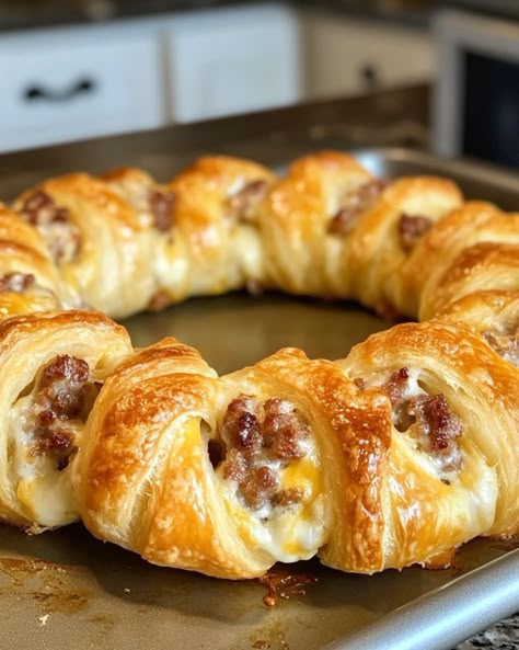 This ring of joy is the crown jewel of any holiday feast, disappearing before the first snow melts! Crescent Ring Recipes, Crescent Recipes, Cheese Puff, Crescent Ring, Cheese Puff Pastry, The First Snow, Crescent Roll Recipes, Chocolate Hazelnut Spread, Crescent Roll Dough