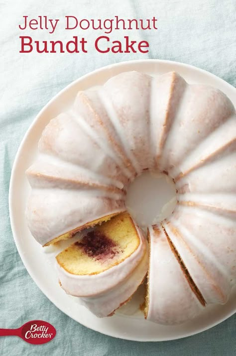 Cake doughnut? Jelly doughnut? Raised and glazed? Now you don’t have to choose. With its fine, moist crumb, raspberry jam filling and sweet glaze, this bundt combines all the best characteristics of these doughnuts into one crowd-sized treat that’s better than anything the bakery has to offer. Candy Bundt Cake, Jelly Donut Bundt Cake, Raspberry Jelly Cake, Raspberry Jelly Desserts, Bundt Cakes With Filling, Bundt Cake Filling Ideas, Jelly Filled Cake, Brunch Bundt Cake Recipes, Jelly Donut Cake