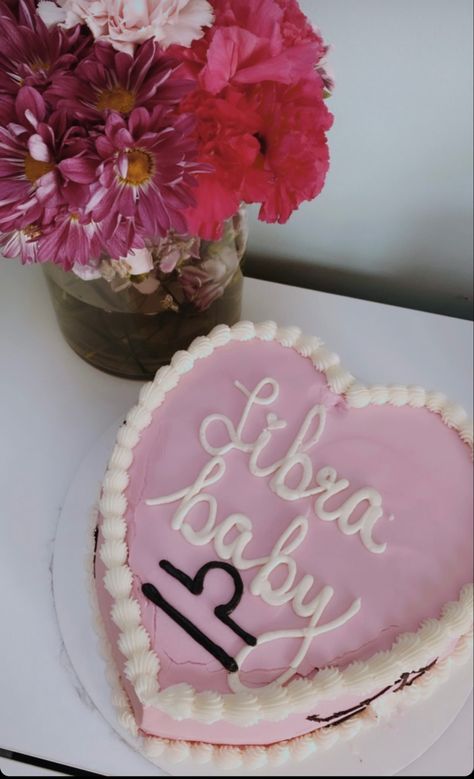 A picture of a pink heart shaped cake that says Libra baby in icing and a bouquet of pink flowers in the background of picture Birthday Cake Libra Zodiac, Libra Season Cake, Libra Szn Cake, Libra Cake Ideas, Libra Birthday Cake, Libra Cake, Libra Princess, Baby Birthday Cake, Art Birthday Cake