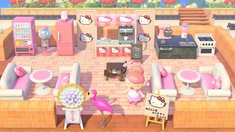 Gathered all cutesy pink items to create this mini Hello Kitty cafe. How was the outcome? : AnimalCrossing Hello Kitty Cafe Acnh, Hello Kitty Island Acnh, Hello Kitty Acnh, Animal Crossing Hello Kitty, Hello Kitty Animal Crossing, Hello Cafe, Pink Gaming Setup, Animal Crossing Cafe, Desk Pink