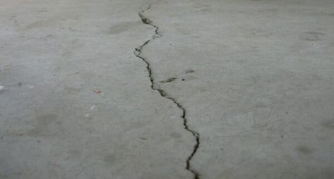 Don't be intimidated by garage floor repairs. Save money by learning how easy it is to repair cracks and pitting in your concrete floor. Concrete Floor Repair, Garage Boden, Garage Floor Paint, Garage Update, Garage Workshop Organization, Garage Repair, Garage Remodel, Garage Door Design, Garage Work Bench