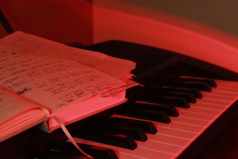 Songwriting Aesthetic Piano, Red Rock Band Aesthetic, Ruby Sunday Aesthetic, Red Piano Aesthetic, Keyboard Aesthetic Piano, Red Notebook Aesthetic, Keyboardist Aesthetic, Piano Keyboard Aesthetic, Keyboard Piano Aesthetic