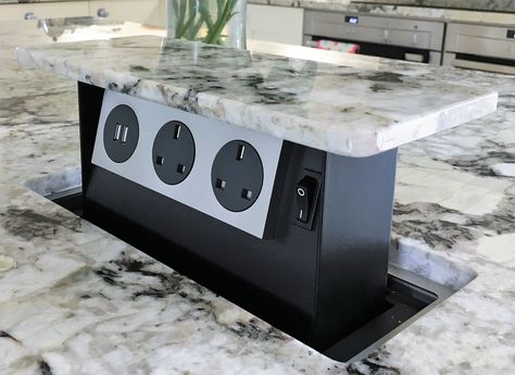 Pop Up Sockets Kitchen Island, Pop Up Plugs In Kitchen, Modern Plug Sockets, Kitchen Outlet Ideas, Pop Up Countertop Outlet, Kitchen Sockets, Countertop Outlets, Kitchen Outlet, Kitchen Outlets