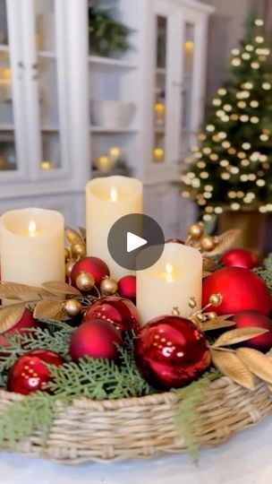 7.5K views · 245 reactions | Elegant Holiday Candle Garden❤️is a simple and stunning holiday centerpiece that combines a few iconic Christmas components setting up your holiday home in style! ✨https://ltk.app.link/CTKtJqOWWOb To style this centerpiece, I started with a faux cedar garland as a lush base for my trio of candles. I then layered in vibrant red ornaments of various sizes and finishes to add a dramatic Christmas flair. Finally, I softened the arrangement with gold accents, incorporating berry and bay leaf picks for that perfect finishing touch.Whether you have a large dining table or a cozy nook, this arrangement can be tailored to fit your space beautifully. #christmascenterpiece #christmasdiy #holidaydecor #holidaydiy #flamelessdecor | Janine Graff Faux Cedar Garland, Janine Graff, Candle Garden, Cedar Garland, Christmas Styling, Iconic Christmas, Holiday Candle, Xmas Deco, Red Ornaments