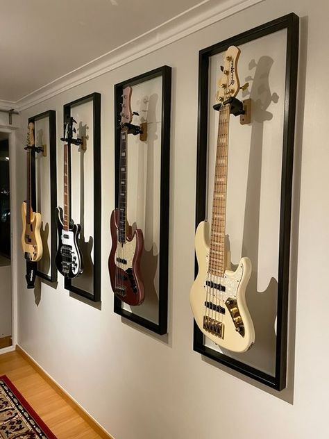 guitar room Music Aesthetic Home Decor, Decorating With Guitars Living Rooms, Wall With Guitars, Living Room Guitar Display, Bedroom With Guitar On Wall, Living Room With Guitars On Wall, Guitar Room Setup, Hang Guitars On Wall Ideas, Framed Guitars On Wall