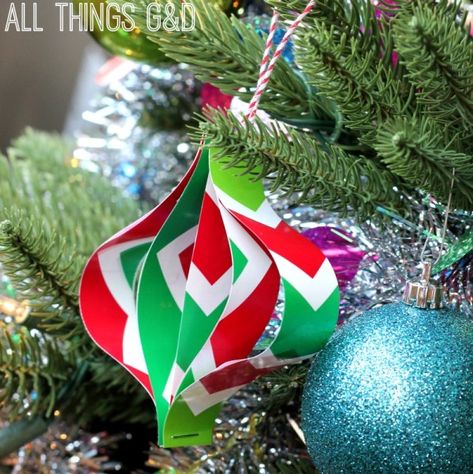 Don't throw those wrapping paper scraps away - use them to make DIY ornaments! A simple tutorial even the kids can do. | www.allthingsgd.com... Wrapping Paper Scraps, Ornaments Kids Can Make, Kids Tree Ornaments, Craft Paper Wrapping, Diy Wrapping Paper, Amazing Christmas Trees, Wrapping Paper Crafts, Recycling Ideas, Paper Scraps