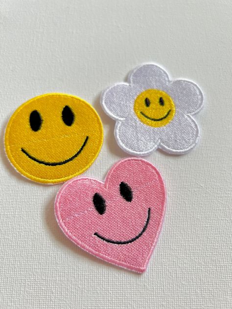 Flower heart smiley face embroidered patches, iron / sew on patches, cute patches, patches, embroidered patch, flower patches, cool patches, by shopchinguembroidery on Etsy Heart Smiley Face, Kaws Painting, Heart Smiley, Cute Patches, Cool Patches, Flower Patch, Straight Stitch, Patch Design, Embroidery Patches