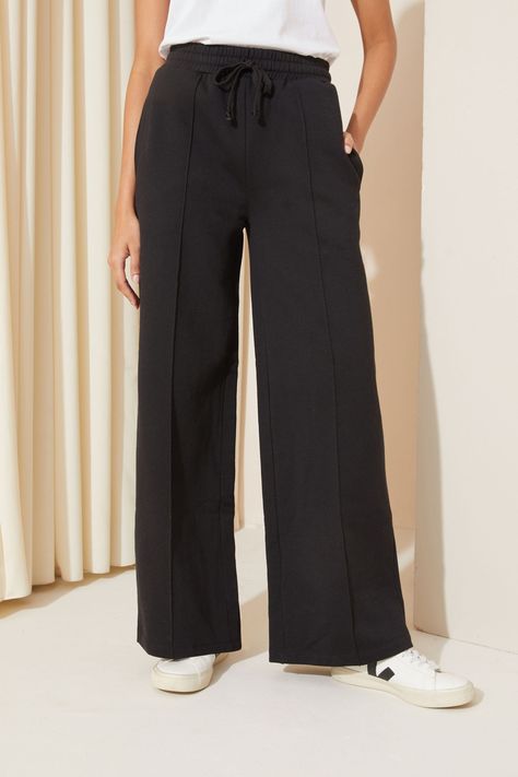 High waisted jersey trousers, perfect for everyday and lounging . Elasticated waistband. Adjustable drawstrings. Pronounced seams. 68% Cotton, 32% Polyester. Jersey Trousers, Drawstring Trousers, Apple Shape, Black Jersey, Co Ord, Trousers Women, For Friends, Next Uk, Favorite Things List