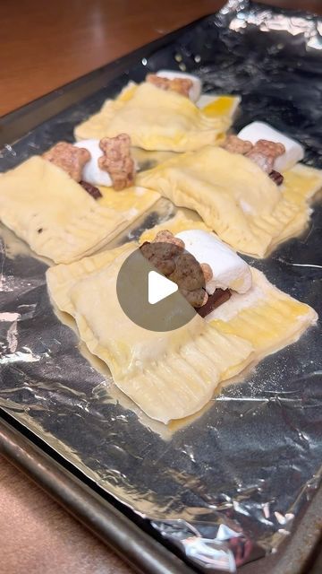 Isaiah Acosta on Instagram: "[RECIPE BELOW] Cozy Teddy Smore Puff Pastries!   —  1.) Cut your puff pastries into large squares/rectangles   2.) Add the pastry squares to a non-stick cookie tray   3.) Chop a large chocolate bar into individual squares and add two to the middle of pastries   4.) Add half a marshmallow above the chocolates  5.) Add Two teddy grahams to the chocolates, resting their heads on the marshmallow pillow  6.) Add egg wash to the inside and all over the puff pastry so it can have a nice golden brown color  7.) Fold over the bottom half of the puff pastry over the chocolates and teddy graham’s bodies  8.) Finally bake them in the oven at 350 degrees until they are browned to your liking! (It was around 10-15 mins for me. But you could always do it longer for a more cri Teddy Grahams, Cookie Tray, Golden Brown, Egg Wash, Puff Pastry, Sweet Desserts, Chocolate Bar, Yummy Treats, Oven