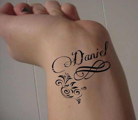 Name tattoo Name: Daniel Danny Tattoo Name, Daniel Tattoo Ideas, Tatto Name, Bf Things, Daniel Tattoo, Tattoos Mom, Card Tattoo Designs, Tattoos With Kids Names, Tattoo Name