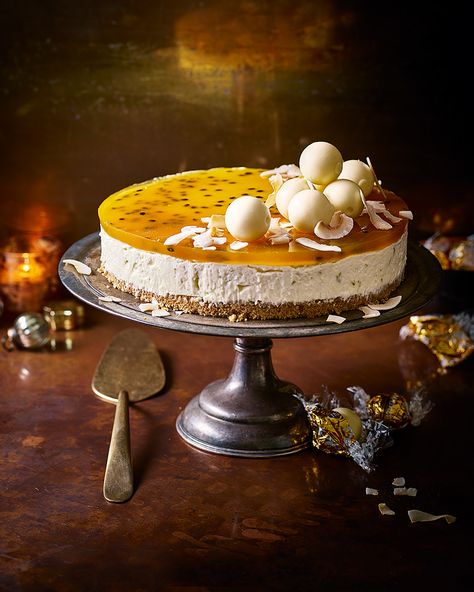 Lindor white chocolate and passion fruit cheesecake - delicious. magazine White Chocolate Passionfruit Cheesecake, Cheesecake With Fruit Topping, Make Ahead Christmas Recipes, Cheesecake Decoration Ideas, Freezable Desserts, Birthday Decorating Ideas, Cheesecake For Christmas, Christmas Cheesecakes, Fruits Tart