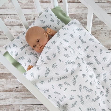 Made of double gauze and fluffy batting, this bedding is very soft and comfortable to cuddle your favorite doll or a stuffed animal.  Features: Includes a comforter (13.5" x 20") and a pillow (9" x 6") Perfect size for most doll bed, crib, or cradle.  Bedding fits a 12" to 18" doll. MADE IN USA * The doll and the bed is not included. * The sage color mattress sold separately. Bed Crib, Animal Features, Crib Comforter, Doll Bedding, Blanket And Pillow, Doll Crib, Cradle Bedding, Doll Beds, Pattern Doll