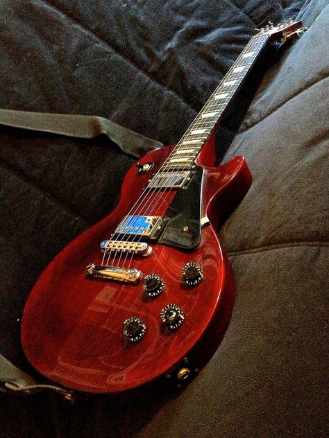 28 Red "Hot Electric"  Gibson Les Paul Studio Wine Red electric guitar. Red Gibson Les Paul, Red Les Paul Guitar, Electric Guitar Les Paul, Red Electric Guitar Aesthetic, Red Les Paul, Relic Guitar, Guitar Aesthetic, Red Electric Guitar, Gibson Les Paul Studio