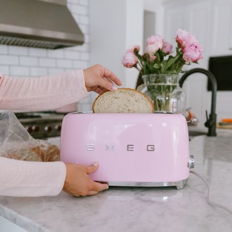 Cutest kitchen things...in PINK - Mint Arrow #mintarrow #pink #pinkkitchenfaves #kitchen #home #baking #kitchenfaves #kitchentools #pinkmixer #kitchenaid #pinktoaster #smeg #apron #giftideas #girly #girlygirl #ovenmitts Pink Appliances In Kitchen, Pink Smeg Kitchen, Pink Appliances, Pink Smeg, Pink Toaster In Kitchen, Pink Toaster And Kettle, Pink Smeg Coffee Machine, Pink Smeg Toaster, Pink Toaster