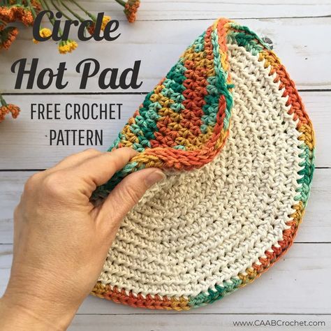 This crochet circle hot pad is double layered for extra protection from hot dishes! You will feel comfortably safe when using this large and thick hot pad, but it's also cute in the kitchen too! Free crochet pattern from Cute As A Button Crochet #caabcrochet #freecrochetpattern #hotpad #potholder Crochet Pot Holders Free Pattern, Crochet Potholder Patterns, Crochet Hot Pads, Infinity Scarf Pattern, Crochet Cowl Pattern, Potholder Patterns, Crochet Potholders, Cute As A Button, Crochet Circles