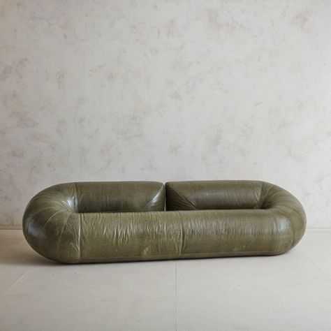 An incredibly rare Space Age ‘Zeppelin’ sofa designed by Walter Leeman for Velda in 1972. Only 20 copies of this sofa were produced. Monumental dimensions and the fluid, tubular structure give this sofa a sculptural aesthetic. The frame is exceptionally constructed of metal and features original, buttery soft olive green leather upholstery with a stunning, natural patina. Decorative tapered side seams and delicate stitching compliment the beautiful craftsmanship. Belgium, 1970s.      DIMENSIONS: 109"W x 36"D x 28H"; Seat Height: 16”H Free Standing Wall, Green Sofa, Space Age, Interior Furniture, Zeppelin, Green Leather, Leather Upholstery, Leather Sofa, Sofa Design