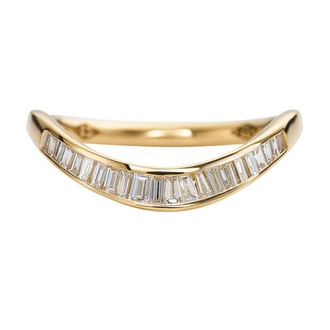 The curved baguette diamond wedding band will add a sophisticated sparkle to your wedding ring set. The design features a pave of baguette and tapered baguette cut diamonds set into an elegantly sloped golden wedding band. MATERIALS 18k solid gold | baguette and tapered baguette cut white diamonds Total diamond carat weight: ~0.2 Diamonds parameters: excellent cut, VS clarity, color E-G, conflict-free Band's width: 2mm Available in YELLOW, WHITE or ROSE 18k gold. Information about Our White Gold Pear With Wedding Band, Curved Wedding Band With Baguettes, Notched Wedding Band, Unique Gold Wedding Bands, Baguette Eternity Ring, Baguette Diamond Wedding Band, Baguette Band, Baguette Wedding Band, Contour Wedding Band