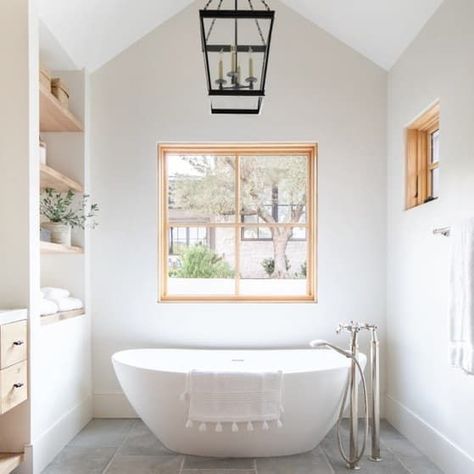 We love this amazing bath project featuring the Elise tub. The warm wood tones, limestone floor and SculptureStone tub are perfectly designed for comfort and relaxation. Mcgee Bathrooms, Crestview House, Vaulted Ceiling Lighting, Ceiling Bathroom, Style Me Pretty Living, Scandinavian Style Home, Primary Bath, Modern Farmhouse Bathroom, Rustic Bathrooms