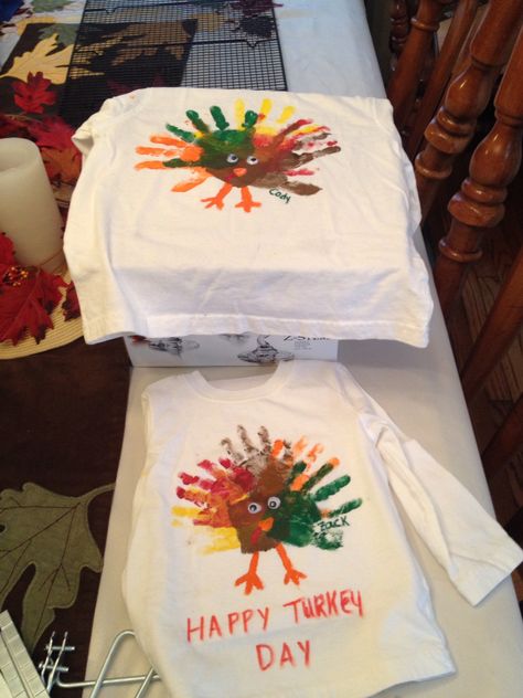 Homemade handprint Turkey shirts. Handprint Turkey, Turkey Handprint Craft, Hand Print Tree, Thanksgiving Crafts For Toddlers, Diy Turkey, Turkey Handprint, Thanksgiving Crafts Preschool, Easy Thanksgiving Crafts, Cute Turkey