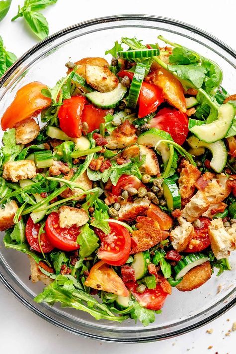 This BLT panzanella salad recipe is bright and flavorful, featuring tomatoes, cucumber, pancetta, capers, and arugula in a zesty vinaigrette. Panzanella Salad Recipe, Cottage Meals, Panzanella Salad, Hearty Salads, Foodie Crush, Best Salad Recipes, Big Salad, Salad Recipes For Dinner, Grilled Asparagus