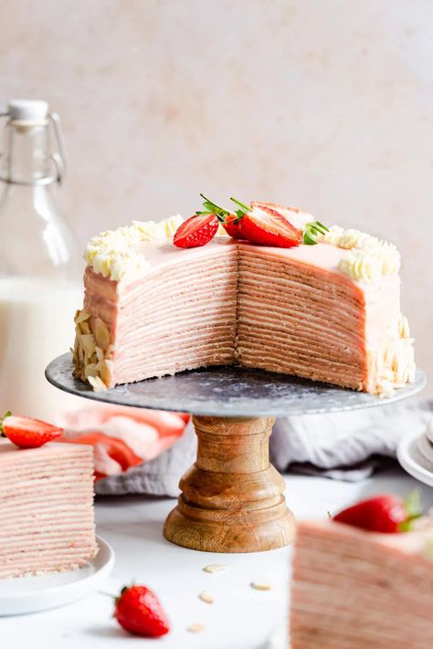 Impress your family and friends with this stunning strawberry crepe cake from Anna Banana! Layers of soft and light crepes and whipped cream, topped with strawberry ganache. Perfect centerpiece for any occasion! #crepecake #dessert Crepes Sweet, Strawberry Crepe Cake, Dessert Crepes, Crepe Cake Recipe, Strawberry Crepes, Chocolate Crepes, Cake Strawberry, Ricotta Cake, Crepe Cakes