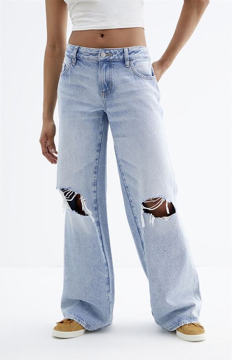 PacSun denim is back with a classic this season — the Casey Light Indigo Ripped Knee Low Rise Baggy Jeans! These super cute Y2K-inspired jeans sit low on the waist and feature an ultra-slouchy relaxed leg, a light indigo wash, and ripped details at the knees for some added edge. They're made with sustainably sourced cotton for an eco-friendly update.Model is wearing a size 26Model measurements: 5’7.5” height, 30.5” bust, 23.5” waist, 36” hipsLearn more about PacSun eco items PacSun Womens Casey Ripped Baggy Jeans, Fall Wishlist, Slim Fit Cargo Pants, Low Rise Baggy Jeans, Baggy Jeans Outfit, Jeans Pacsun, Jeans Outfit Women, Pacsun Jeans, Curve Jeans