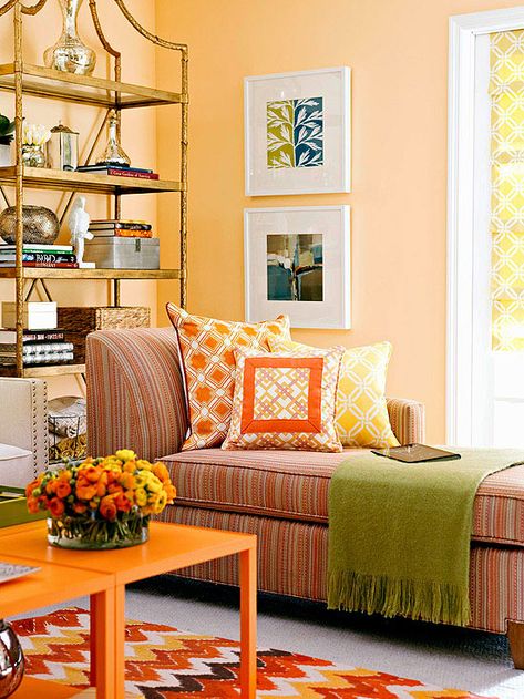 Use warm colors to create a cozy and inviting atmosphere! More cozy color schemes: http://www.bhg.com/decorating/color/schemes/cozy-color-schemes-for-every-room/?socsrc=bhgpin092113peachandorange&page=3 Basement Color Schemes, Family Room Paint Colors, Family Room Paint, Warm Color Schemes, Decor Color Schemes, Living Room Orange, Room Paint Colors, Room Color Schemes, Room Color