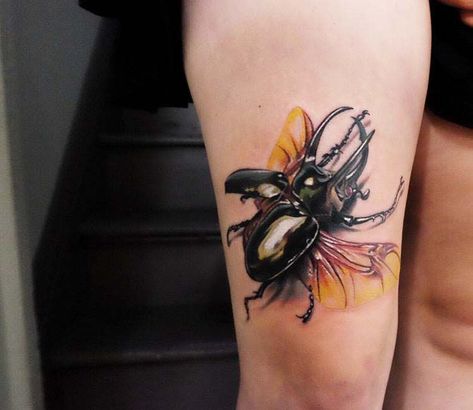 Very nice 3 colors realistic tattoo work of Rhinoceros Beetle motive done by artist Kristian Kimonides Tattoo | Post 23459 | World Tattoo Gallery - Best place to Tattoo Arts Beetle Tattoo Meaning, Rhinoceros Beetle Tattoo, Rhino Beetle Tattoo, Beetles Tattoo, Tattoo Beetle, Fine Tattoos, Rhinoceros Beetle, Lucky Tattoo, Rhino Beetle