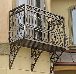 A balcony from Metalcraft. This powder-coated metal balcony was custom-engineered and built by Metalcraft. The metal brackets below the balcony are load-bearing. Balcony House Second Story, Second Story Balcony, Balcony Floor, Second Floor Balcony, Balcony Flooring, Balcony Grill, Balcony Railing Design, Backyard Buildings, Small Balcony Design