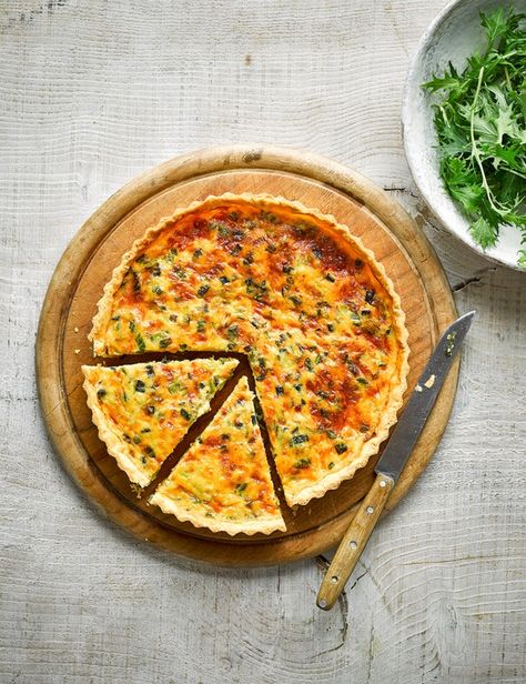 Using spring onions and ready-made pastry cuts down the cooking time so you can bake this classic vegetarian tart midweek Vegetarian Tart Recipes, Vegetarian Tart, Onion Quiche, Cheese Tarts, Savory Tart, Shortcrust Pastry, Three Cheese, Quick Weeknight Dinners, Quiche Recipes