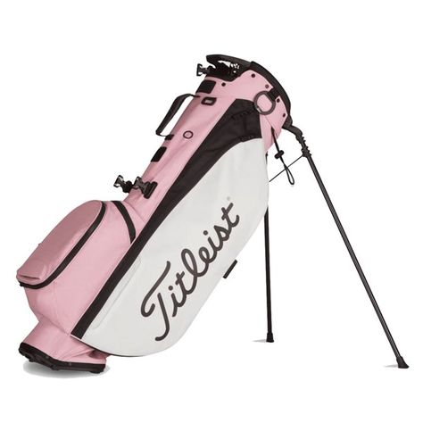 Titleist Ladies Camo Players 4 Pink Out Stand Bag - Special Collection - PINK OUT STYLE. PLAYERS 4 DESIGN.The new Pink Out Players 4 Stand Bag brings a stylish look to the popular Players 4 design. Made from premium heathered material, this design features a durable, lightweight construction, external drink pocket and high-grade aluminum legs.Premium heathered materialNEW Premium double strapQuick-access magnetic accessories pocketPlayer-preferred external water bottle pocketHigh-grade aluminum Titleist Golf Bag, Golf Aesthetics, Vegas Aesthetic, Golf Aesthetic, Cute Golf Outfit, Golf Girl, Titleist Golf, Golf Inspiration, Golf Stuff