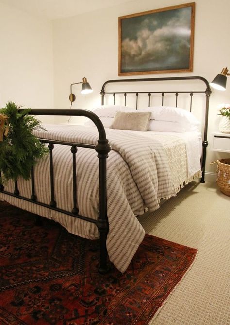 art + bedframe + rug Bedroom Vintage Gallery Wall, Simple Made Bed, Farmhouse Striped Bedding, Organic Modern Bedroom Black Bed, How To Make A Guest Bed, Striped Duvet Bedroom, Iron Bed Frame Bedroom Decor, Striped Comforter Bedroom, Black Iron Bed Decor