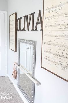 Framed Children's Clothes + Little Girl Bedroom Wall Decor on a Budget | Bless'er House - The barre and oversized sheet music is adorable! Girls Ballerina Bedroom, Ballet Bedroom, Ballerina Bedroom, Bedroom Makeover Before And After, Ballet Room, Ballerina Room, Girls Bedroom Makeover, Small Bedroom Remodel, Girls Room Wall Decor