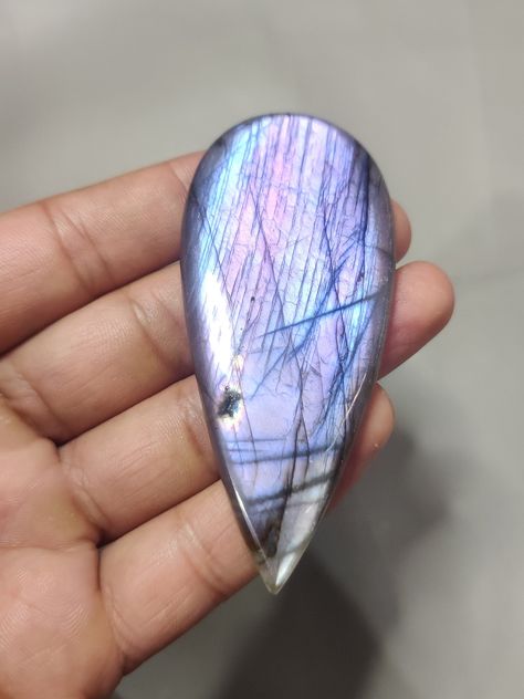 100 % NATURAL PURPLE LABRADORITE CABOCHON GEMSTONE, PURPLE FIRE LABRADORITE LOOSE GEMSTONE, LABRAODORITE HANDMADE SMOTH POLISH, PURPLE FLASHY LABRADORITE FOR WIRE WRAP JEWELRY. STONE AT WHOLESALE PRICE FROM MANUFACTURER. GEMSTONE :- LABRADORITE SIZE :- 88x38x8 MM WEIGHT :- 216.00 CARAT APPROX. SHAPE :- PEAR QUALITY :- VEARY GOOD QUANTITY :- 1 PIECE SERVICE :- DRILLING - On Customer Demand, Free of Cost. :- We also accept wholesale orders and all kinds of gemstones are available :- Please Message Purple Fire, Wire Wrapping Stones, Labradorite Crystal, Wrap Jewelry, Labradorite Cabochon, Labradorite Jewelry, Purple Labradorite, Stone Crystal, Jewelry Gemstone