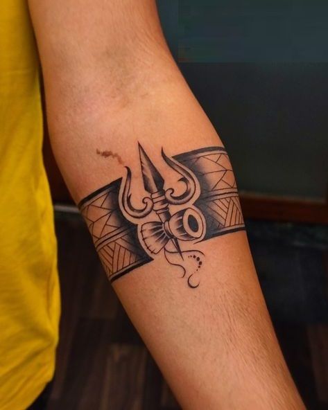 Armband Tattoo Design Band Tattoo For Man, Tattoo Designs Band For Men, Tattoo Hand Band Men, Om Tattoo Designs Men Arm, Trishul Armband Tattoo Design, Best Band Tattoos For Men, Shiva Related Tattoo Design, Wrist Band Tattoo Men Design, Om Band Tattoo