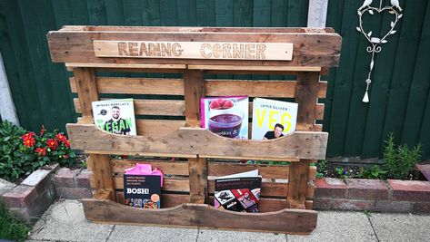 Made from a pallet, scrounged wood and wood dye. Sign made by burning the wood. Pallet Bookcase, Earth Room, Autumn Outdoors, Childcare Ideas, Wood Dye, Wood School, Outdoor Learning Spaces, Cozy Reading Corners, Pallet Outdoor