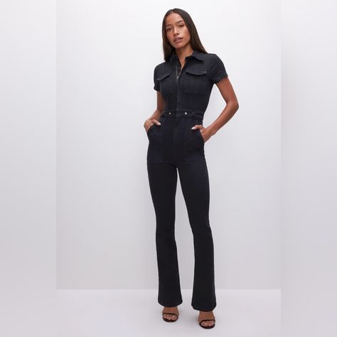 New With Tags Sold Out In Size Small! Stretchy Black Denim Utility Cargo Jumpsuit As It Looks. A Denim Jumpsuit Featuring Hidden Front Zipper Closure And Breast Pockets. It Makes You Look Effortlessly Put Together With Minimal Styling. We Updated This Look With A Bootcut Flare For That Ultra 70's Feel. Collar Neckline Short Sleeves Front Zipper Closure Chest, Side And Back Pockets Snap Button Closures At The Waistline Bootcut Legs Black Wash Fabric: 72% Cotton, 25% Pre-Consumer Cotton, 2% Elaste Black Denim Jumpsuit, Cargo Jumpsuit, Denim Jumpsuit, Good American, Recycled Cotton, Snap Button, Black Denim, Front Zipper, Pant Jumpsuit