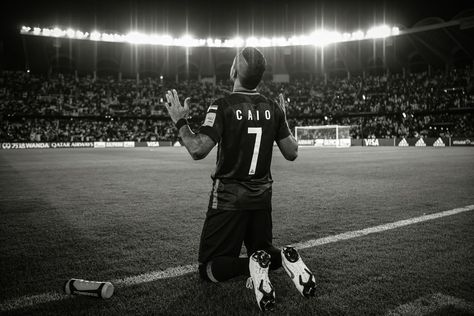 ABU DHABI, UNITED ARAB EMIRATES - DECEMBER 22: (EDITOR'S NOTE: This images has been converted to black and white) Caio of Al Ain FC prays prior to the FIFA Club World Cup UAE 2018 Final between Al Ain and Real Madrid at the Zayed Sports City Stadium on December 22, 2018 in Abu Dhabi, United Arab Emirates. (Photo by David Ramos - FIFA/FIFA via Getty Images) Al Ain Fc, Fifa Club World Cup, Club World Cup, Al Ain, December 22, Arab Emirates, United Arab Emirates, Abu Dhabi, Real Madrid