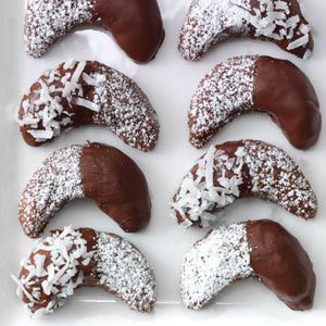 Chocolate Almond Crescents Recipe from Taste of Home | If you like chocolate-covered almonds, you’re in for a treat! Almond Crescents, Easy Christmas Desserts, Almond Crescent Cookies, Italian Rainbow Cookies, Crescent Cookies, Chocolate Covered Almonds, Christmas Desserts Easy, Chocolate Crinkles, Baking Cocoa