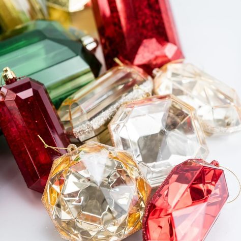 Are you decorating with gems, crystals, and rhinestones this holiday? Bling 💎 is hot and we are here for it!!! 🔥 Greenery market has gem ornaments in over 10 colors and so many different shapes and sizes. If your team sparkle we also have ribbons and flowers dripping in faux crystals for your holiday tree decorating. #gemstones #gems #gemornaments #christmasbling #christmasgems #christmasdecorations #christmastreedecorations #christmasribbon Gem Ornaments, Christmas Bling, Gems Crystals, Tree Decorating, Christmas Ribbon, Holiday Tree, Different Shapes, Tree Decorations, Christmas Tree Decorations