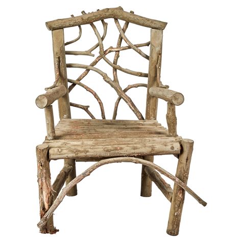 Incredible Adirondack-style wooden armchair made from reclaimed branches, twigs and logs. Solid frame, arm and seat made of logs with back details in smaller branches. Highly weathered and distressed patina on wood. Note front right leg of chair is very weathered compared to the others, please see images for detail.