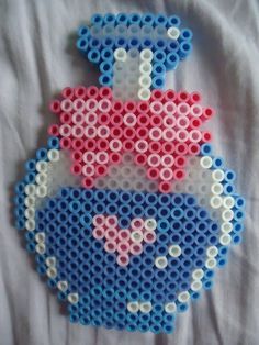 Adorable kawaii potion/bottle perler Love Potion No 9, Melt Beads Patterns, Easy Perler Bead Patterns, Perler Creations, Bead Creations, Melty Bead Patterns, Pearl Beads Pattern, Perler Ideas, Easy Perler Beads Ideas